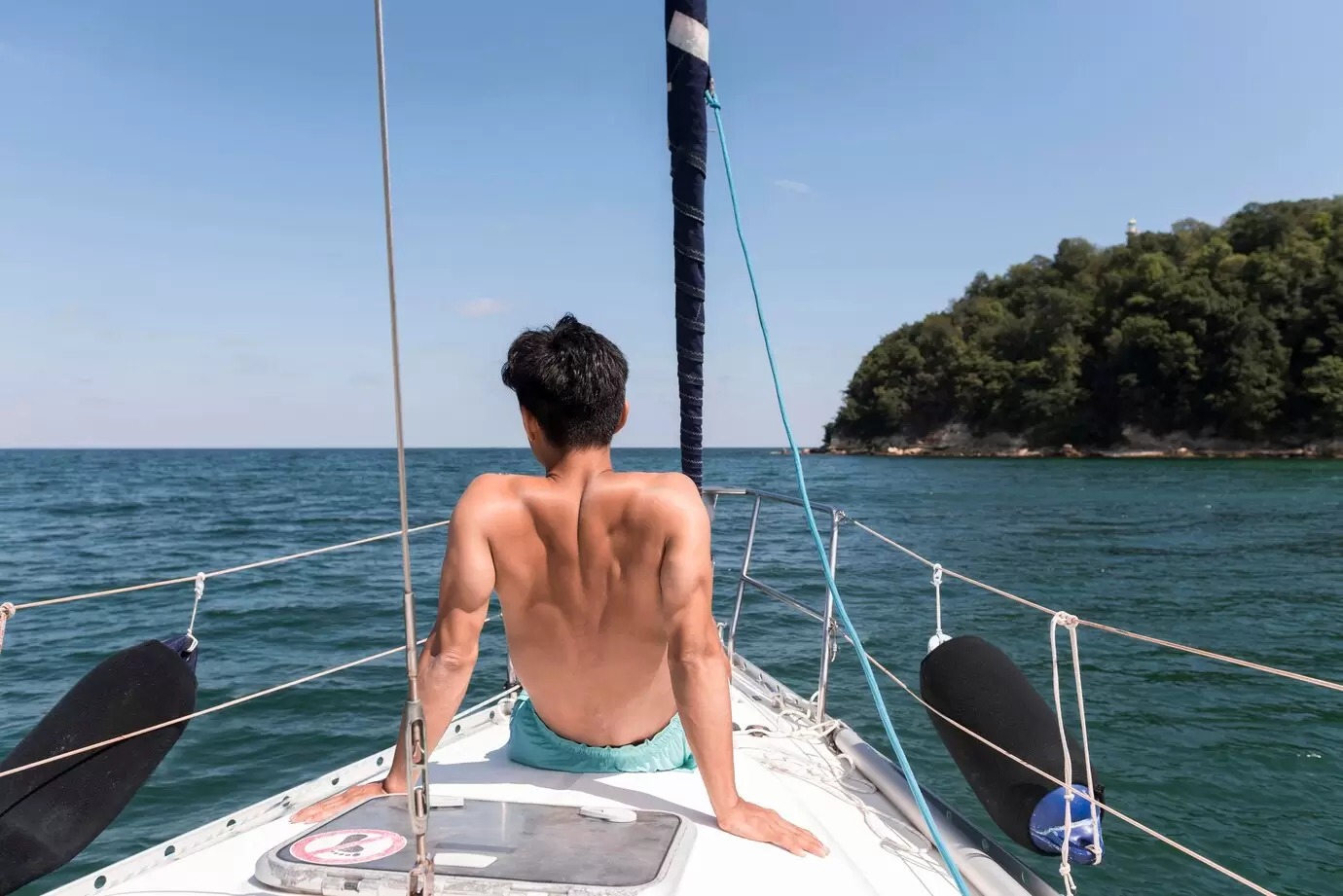 back-view-young-man-enjoying-vacation-boat_23-2148727062