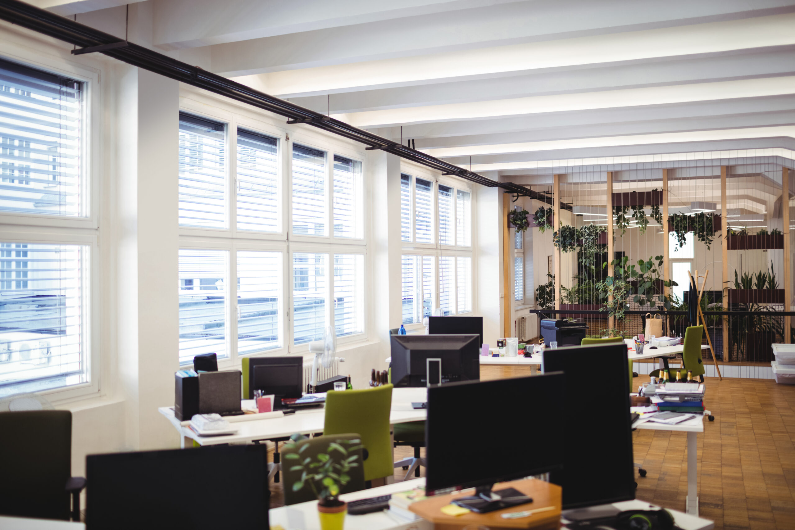 View of empty office workplace with table, chair and computer